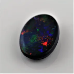 5.82 Carat Black Opal Cabochon Red Blue Green Orange Pin Fires