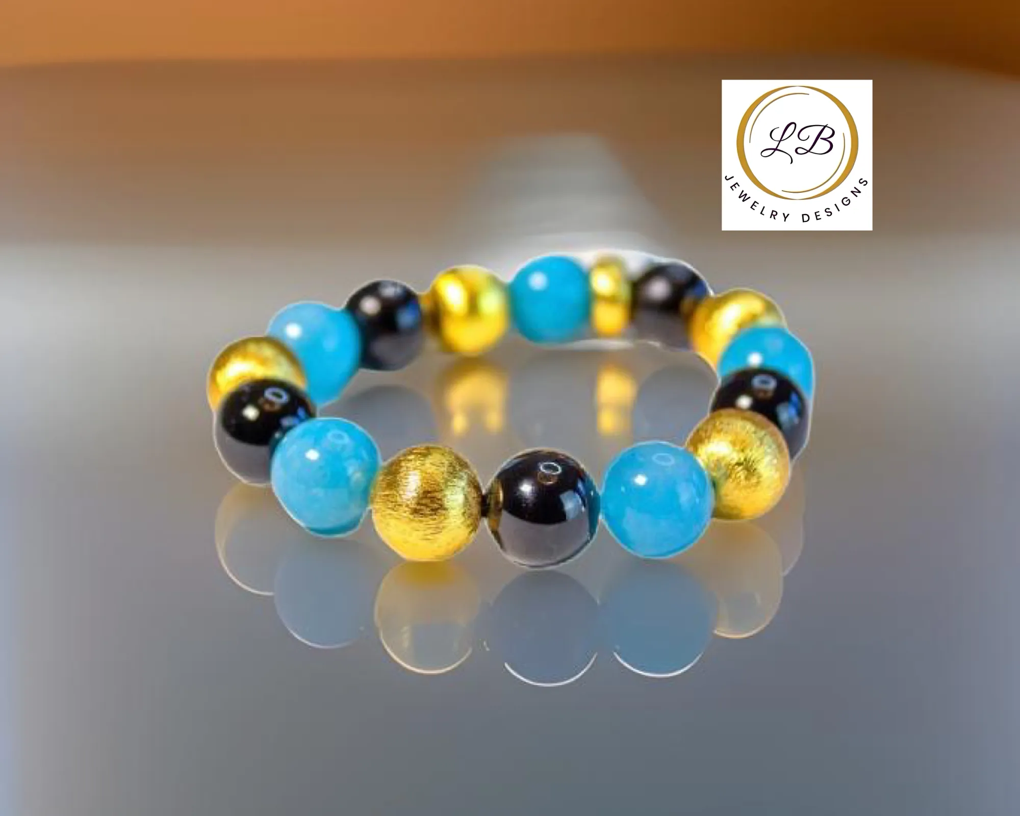 Black Onyx & Aquamarine Gemstone Gold Beaded Bracelet