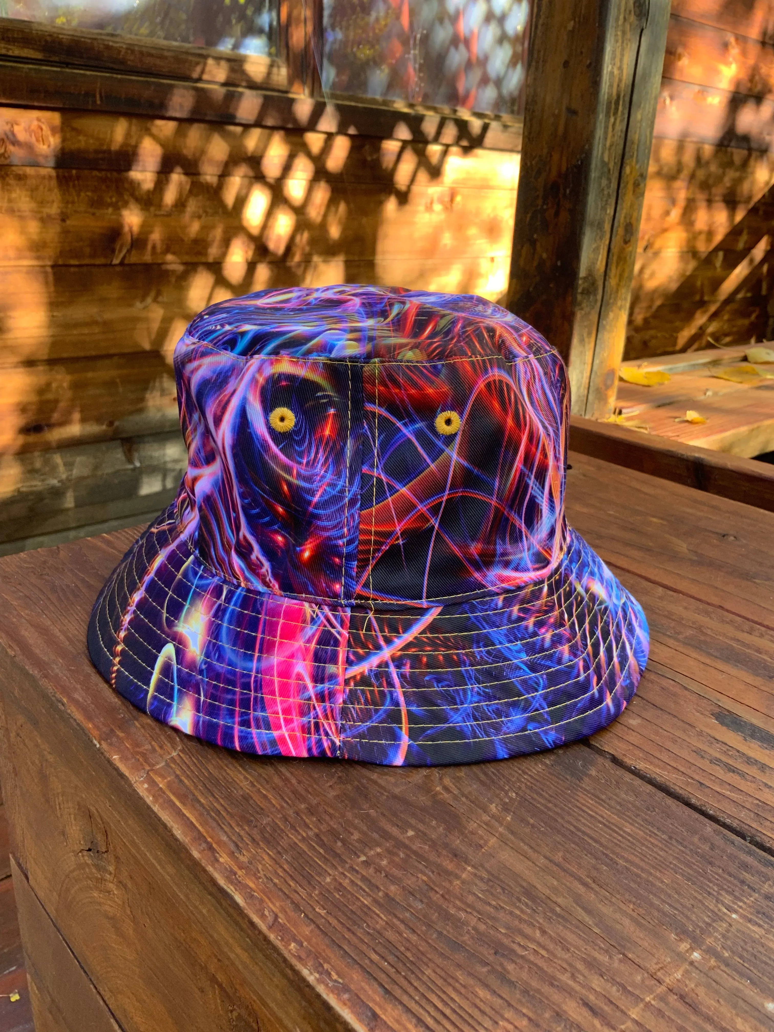 Cosmic Noise/Sound Waves Over Dark Reversible Bucket Hat