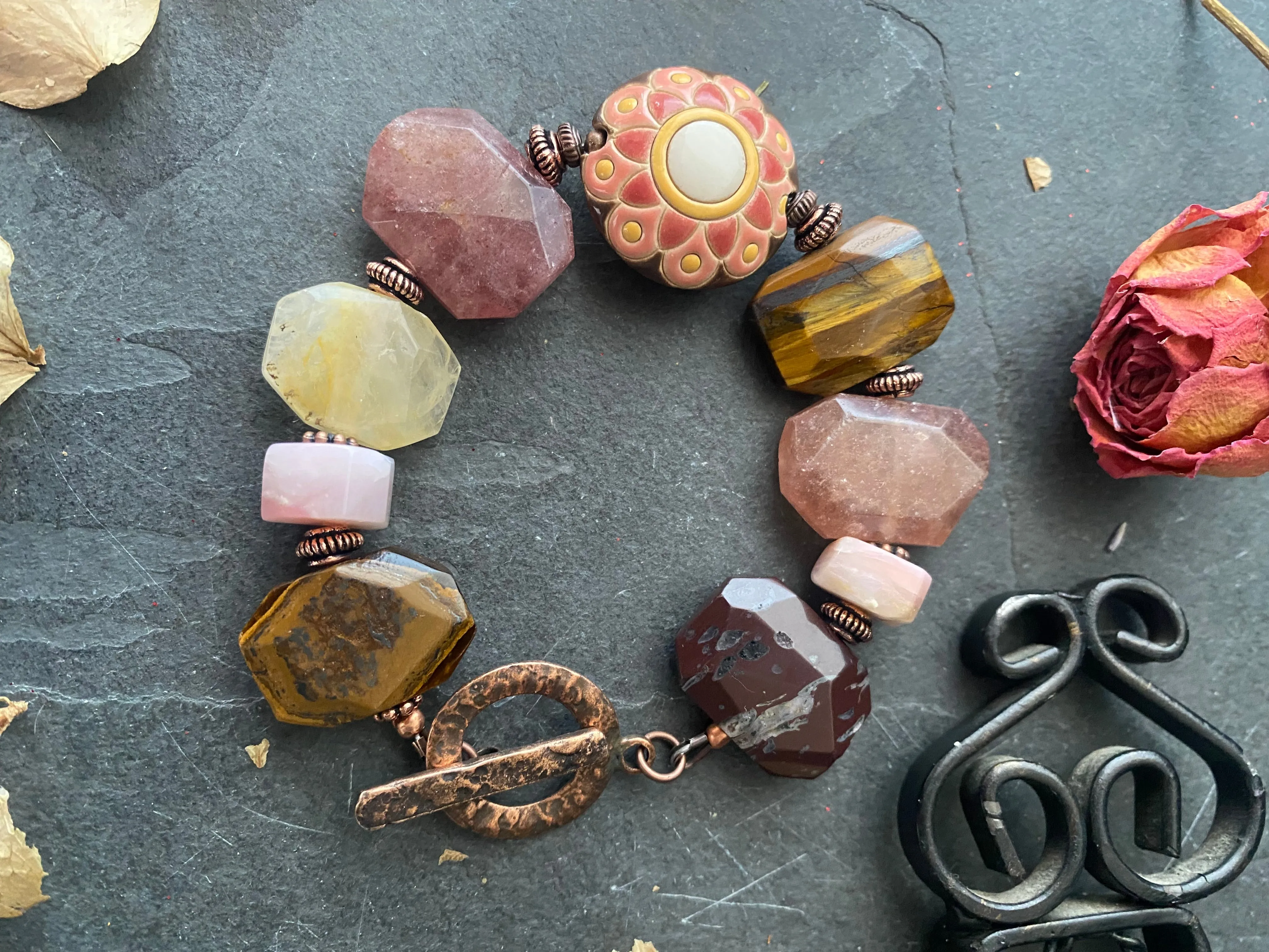 Flower ceramic focal bead, brown and pink with yellow stone, copper metal, bracelet